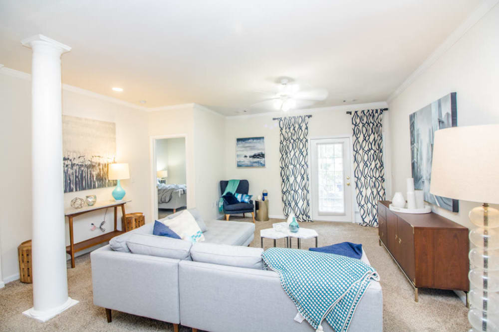 Model apartment living room at Oakbrook Village in Summerville, South Carolina