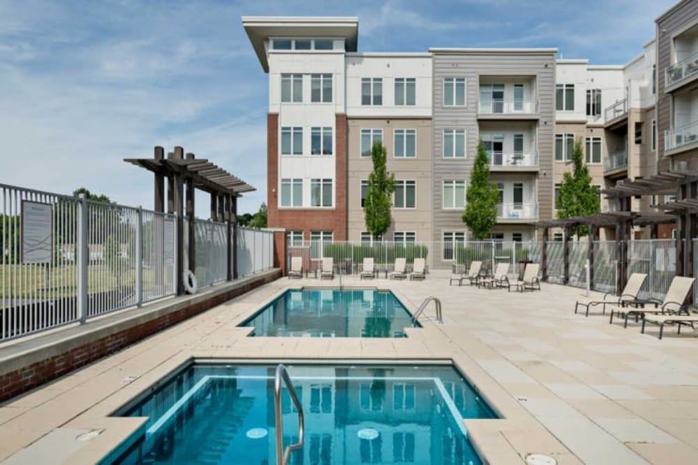 Large pool next to a hot tub at Arcadia at Rivers Edge in Medford, Massachusetts