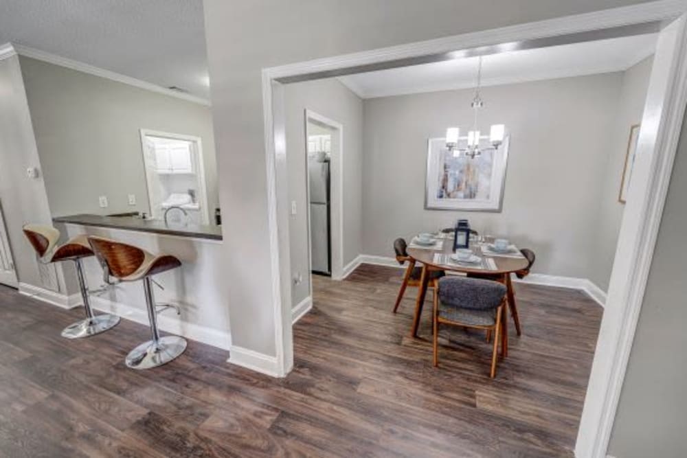 Plush carpeting in an apartment living room next to the bathroom at Brighton Park in Byron, Georgia