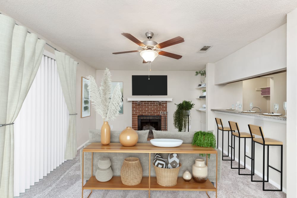 Living room with fireplace at Austell Village Apartment Homes in Austell, Georgia