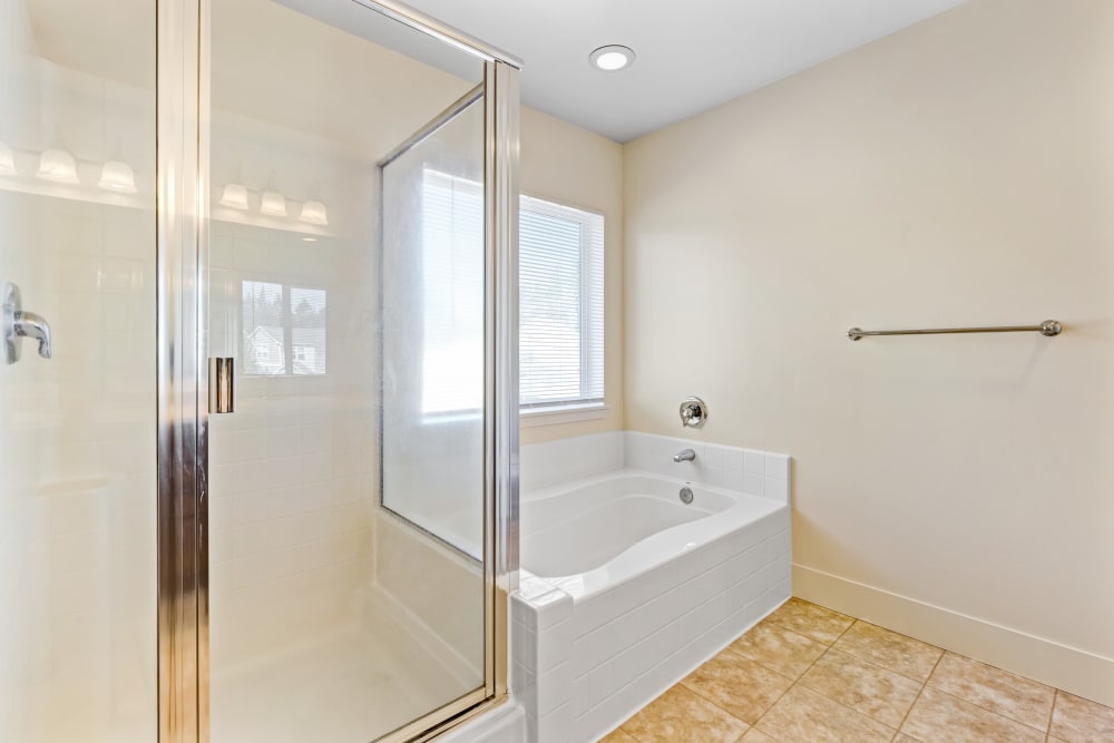 Bathroom with stand up shower and soaker tub at Cascade Village in Joint Base Lewis McChord, Washington