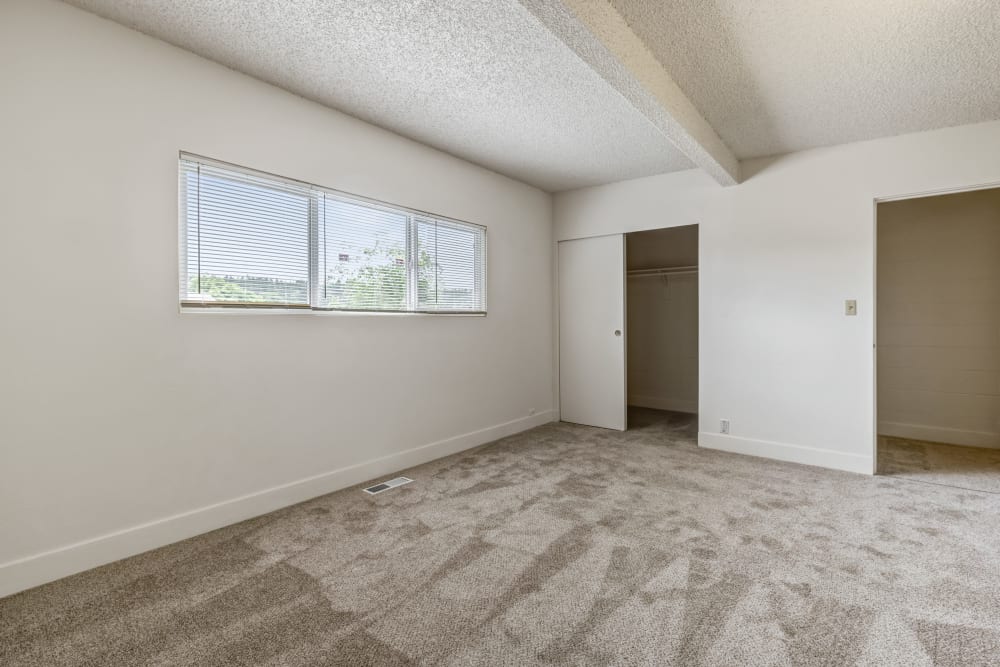 Large bedroom with walk in closet at Clarkdale in Joint Base Lewis McChord, Washington