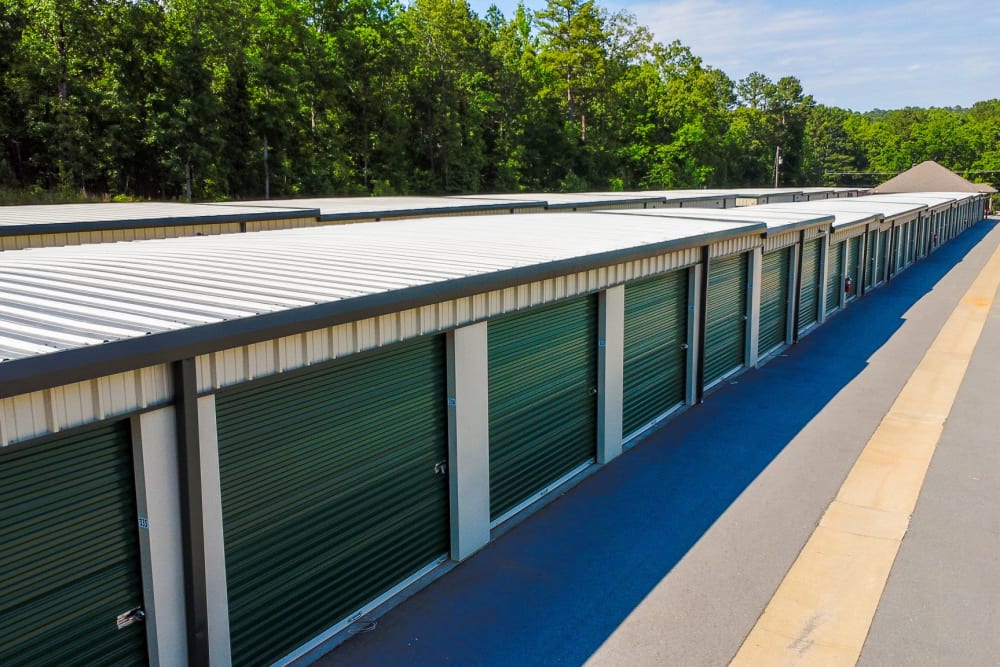 Overview of  the Storage units with green rollup at Highway 10 Storage in Little Rock, Arkansas