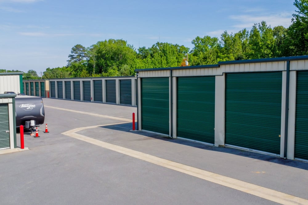 Storage units with green rollup at Highway 10 Storage in Little Rock, Arkansas