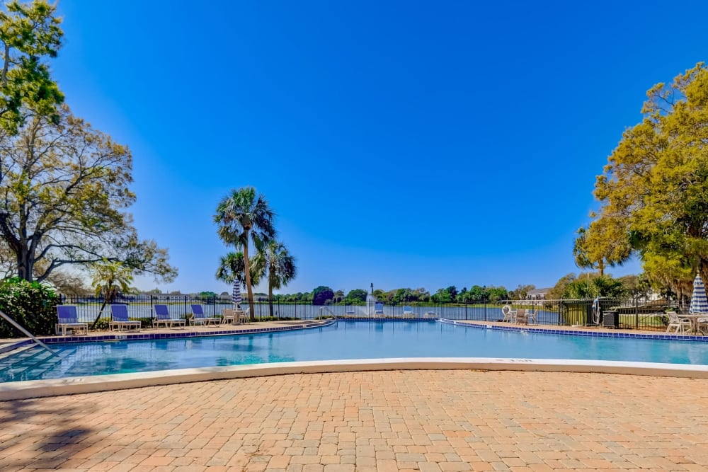 Outdoor swimming pool area at Reserve at Lake Pointe Apartments & Townhomes in St Petersburg, Florida