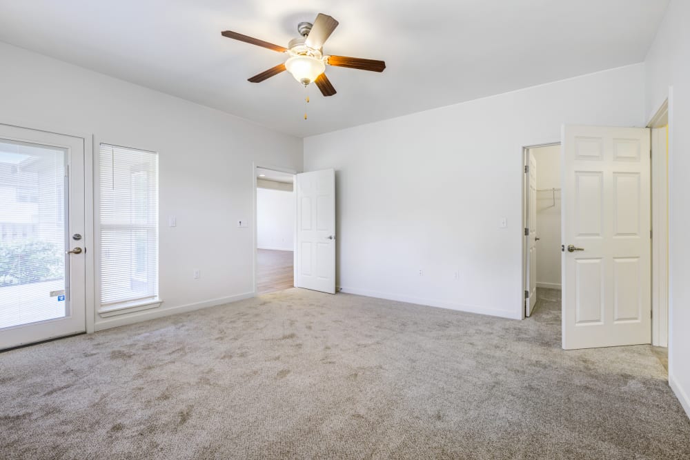 Bedroom with ceiling fan at Meriwether Landing in Joint Base Lewis McChord, Washington