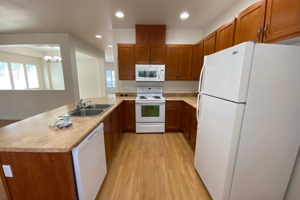 Kitchen with ample storage at Cascade Village in Joint Base Lewis McChord, Washington