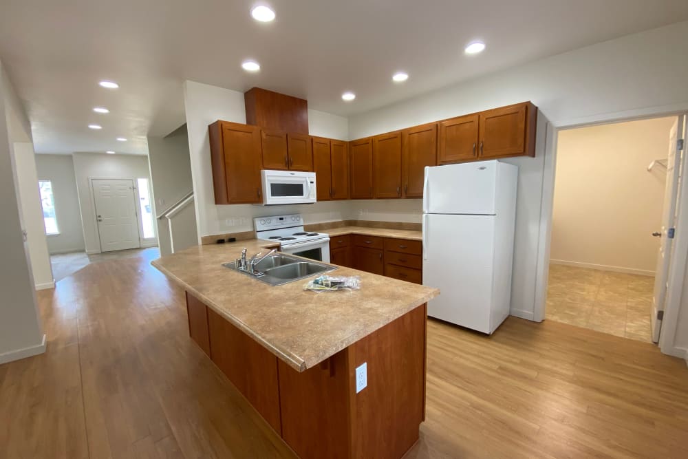 Kitchen with peninsula island at Cascade Village in Joint Base Lewis McChord, Washington