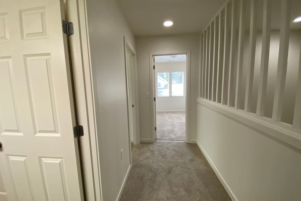 Second floor landing with carpet at Cascade Village in Joint Base Lewis McChord, Washington