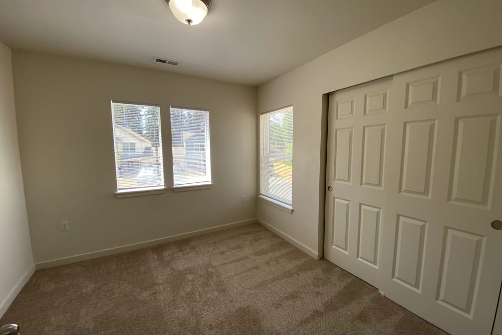 Bedroom with carpet at Cascade Village in Joint Base Lewis McChord, Washington