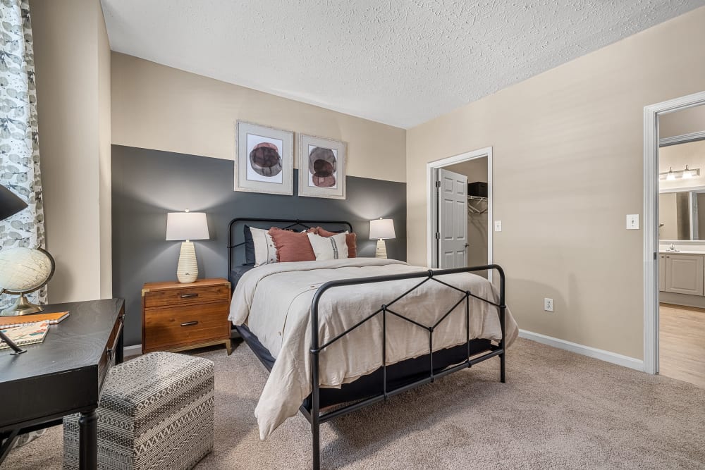 large bedroom with carpet at Marquis at Sugarloaf in Duluth, Georgia