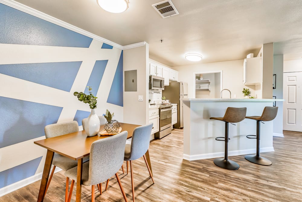 Unique Kitchen and dining space at The Pines at Castle Rock Apartments in Castle Rock, Colorado