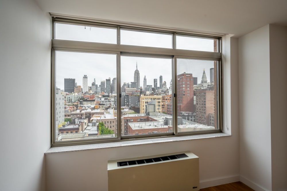 Windows with a view of the city at The Sierra Chelsea in New York, New York