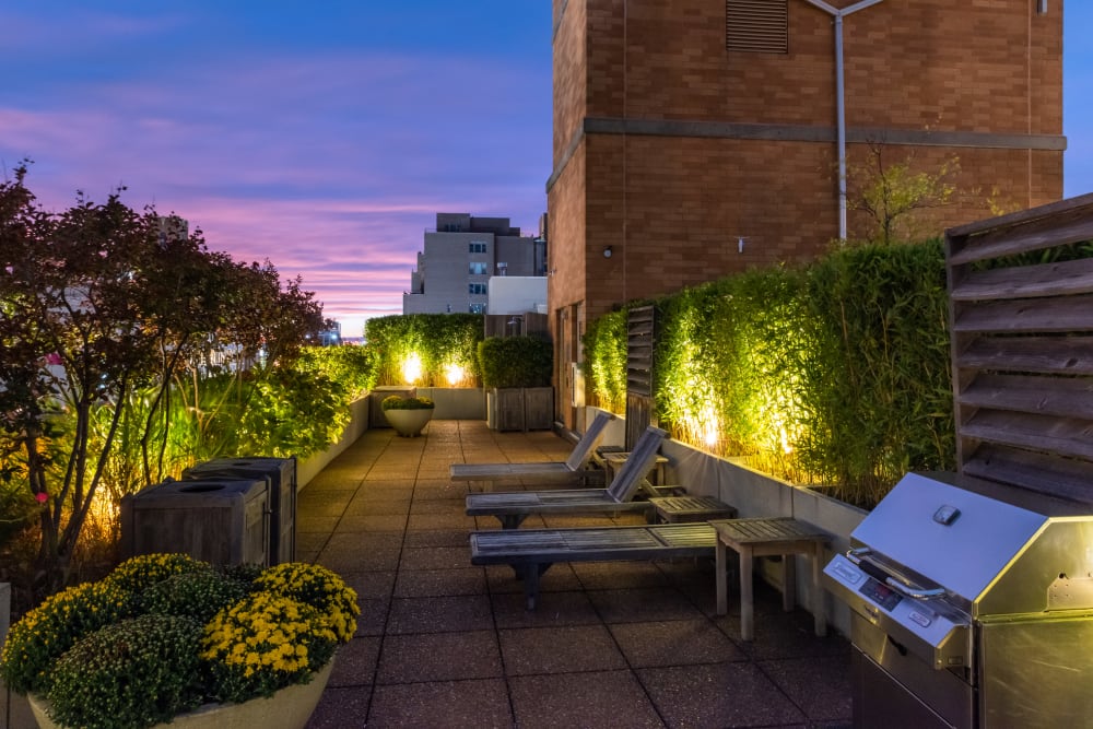 Rooftop deck at dusk with beautiful views at The Sierra Chelsea in New York, New York