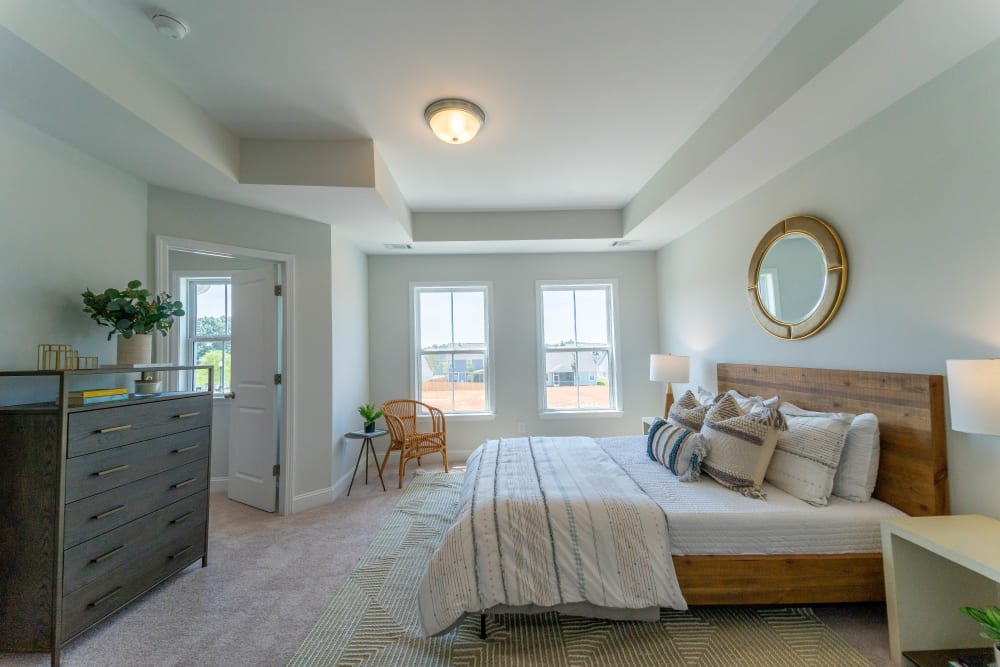Spacious bedroom with large windows at Baldwin Chase in Mauldin, South Carolina