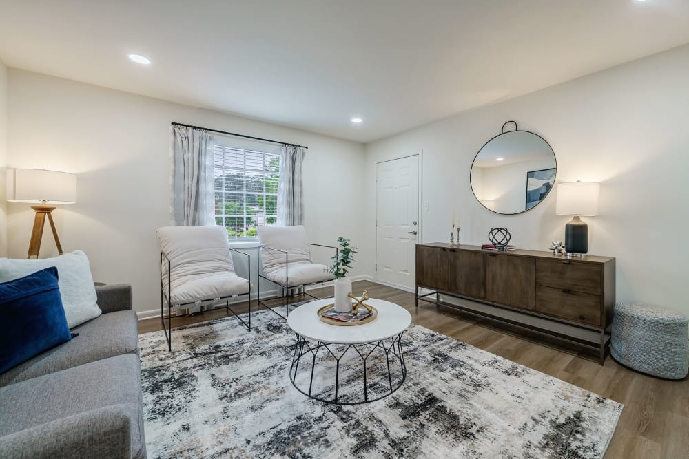 Modern white themed living room at ibex Park in Smyrna, Georgia