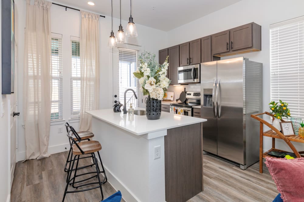 Happy family loving their new rental home at parcHAUS AT CELINA PARKWAY in Celina, Texas