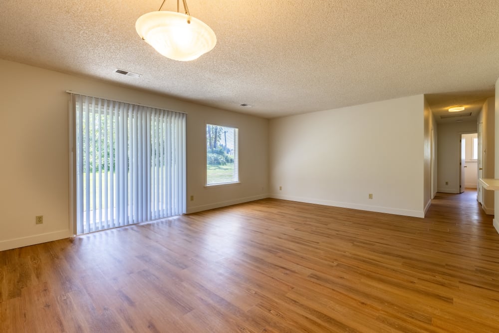 Living room with access to backyard at New Hillside in Joint Base Lewis McChord, Washington