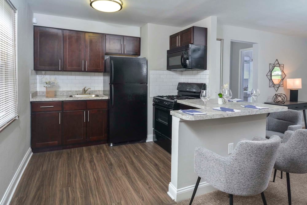 Model kitchen with wood cabinets at The Alden, Pittsburgh, Pennsylvania