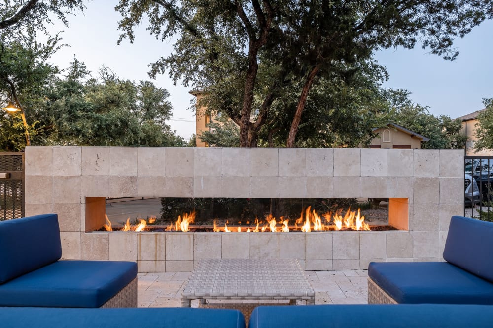 Outdoor Fireplace with seating at Marquis at Barton Trails in Austin, Texas