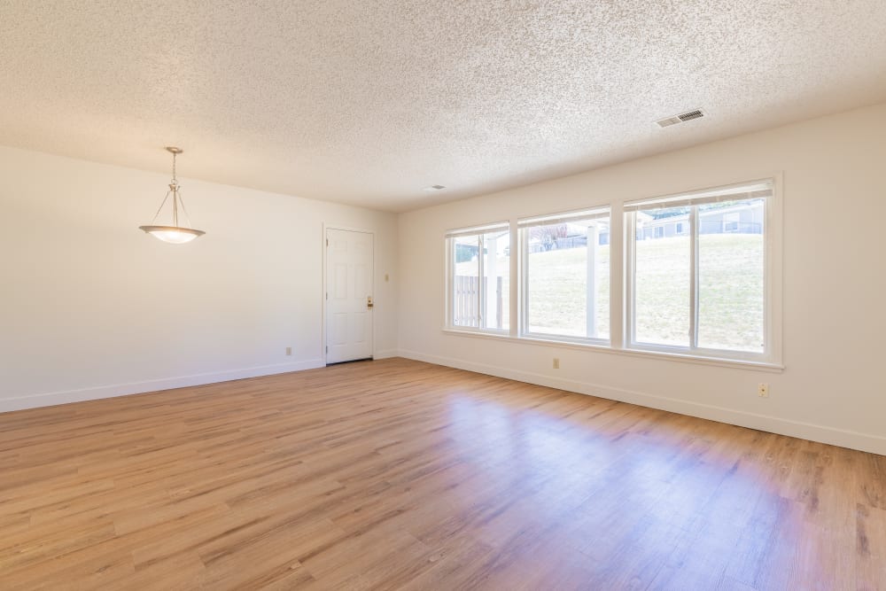 Livingroom with expansive windows at Davis Hill in Joint Base Lewis McChord, Washington