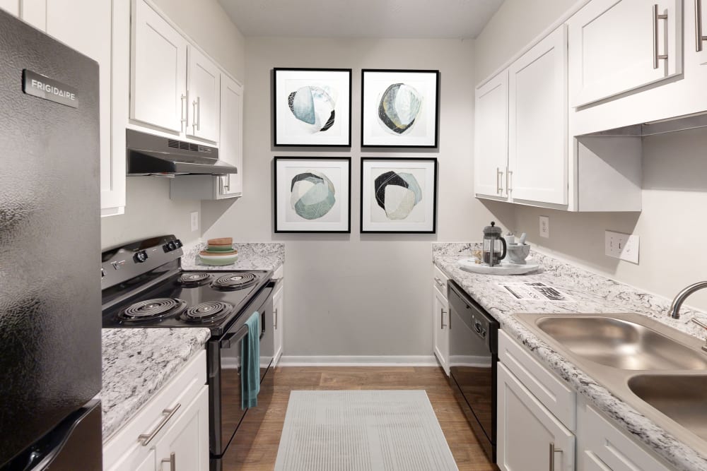 Black appliances in kitchen at The Retreat at Eddins in Montgomery, Alabama