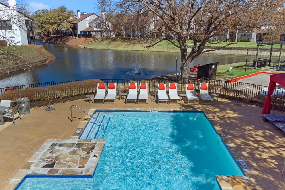 Outdoor swimming pool at Embry Apartments in Carrollton, Texas