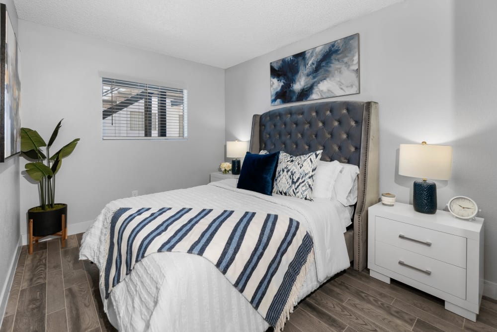 Cozy, luxurious model bedroom at Las Brisas Apartments in Tucson, Arizona