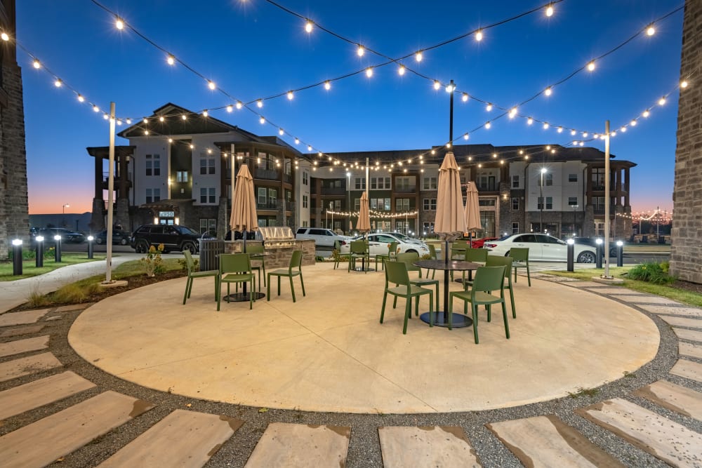Outdoor seating with mood lighting at Fitzroy Grove in Rogers, Arkansas