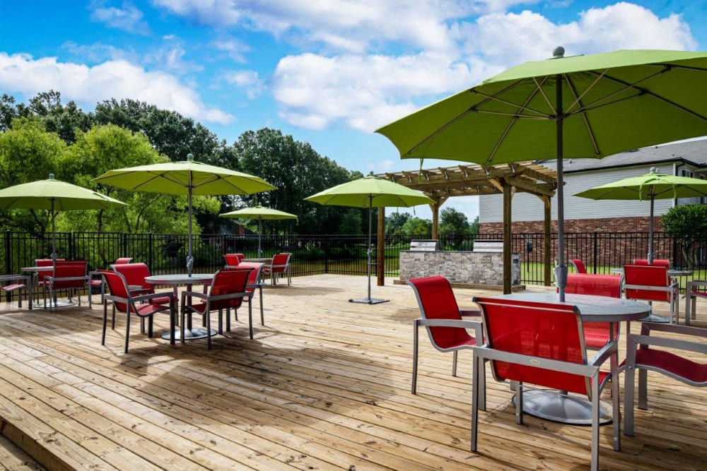 Poolside deck seating at Southwind Apartments in Richland, Mississippi