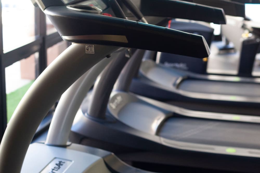 A glimpse at the various aerobic exercise equipment, such as treadmills and ellipticals, ready for residents to use in the fitness center at Veranda La Jolla in San Diego, California