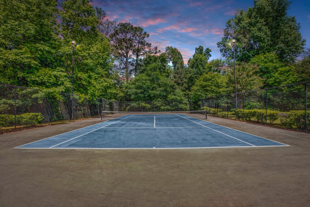 Tennis Court area at Amber Chase Apartment Homes in McDonough, Georgia