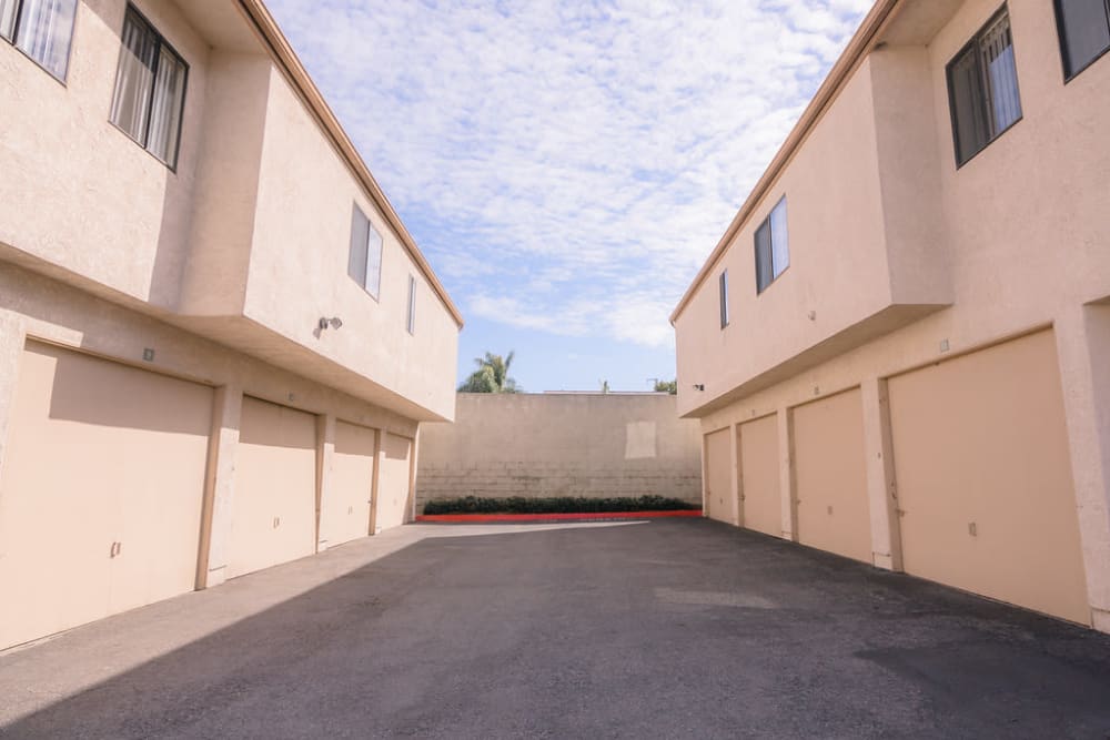 Parking behind units at Wallace Court Apartments in Costa Mesa, California