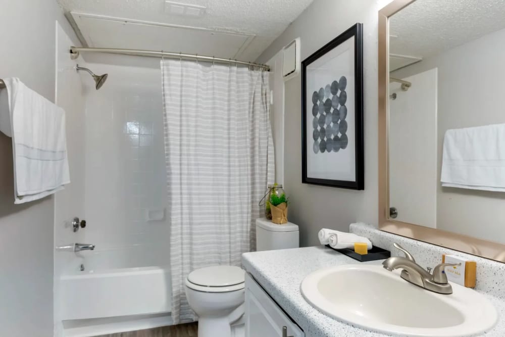 Bathroom with a large counter at Valley Oaks in Hurst, Texas