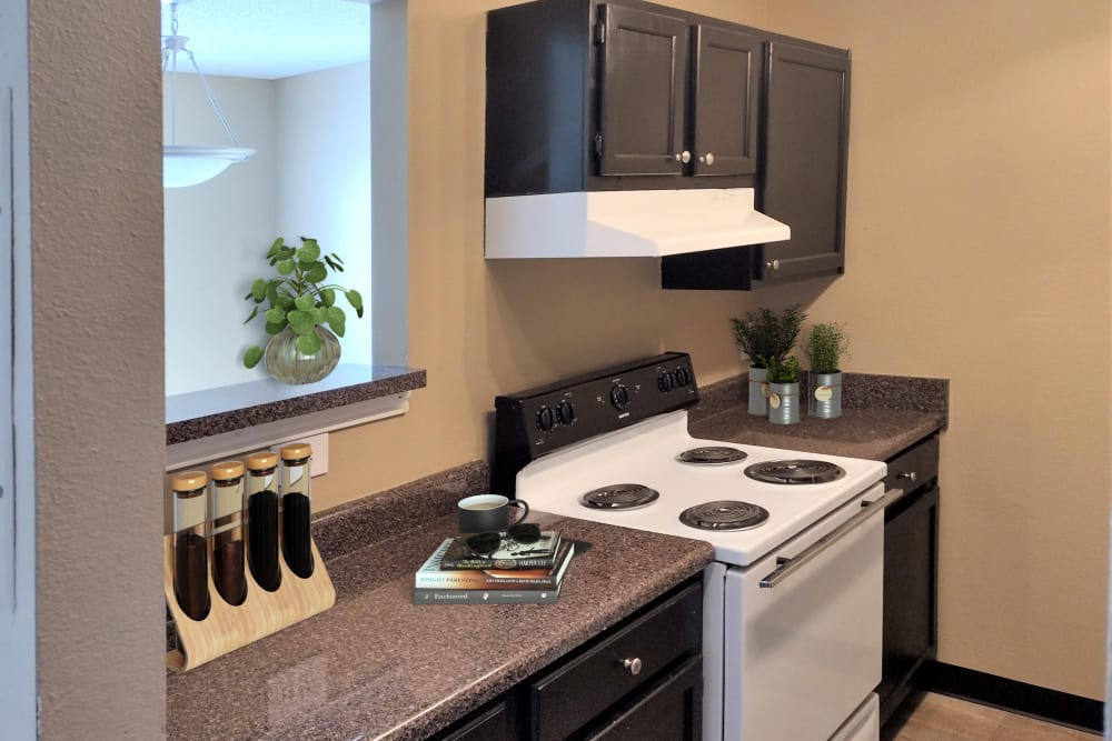 Kitchen with granite countertops at Cypress Creek Townhomes in Goodlettsville, Tennessee