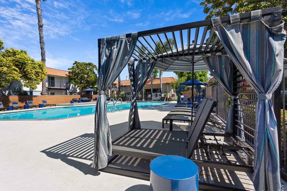 Comfortable pool seating and shaded cabanas on a gorgeous day at Terra Camarillo in Camarillo, California