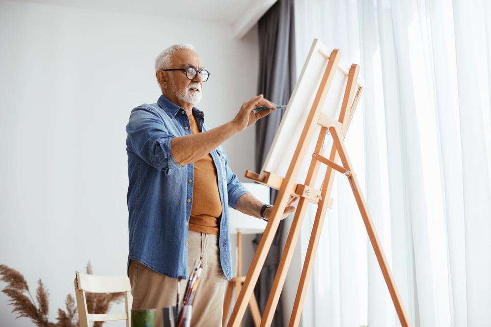 Resident painting at Ponté Palmero in Cameron Park, California