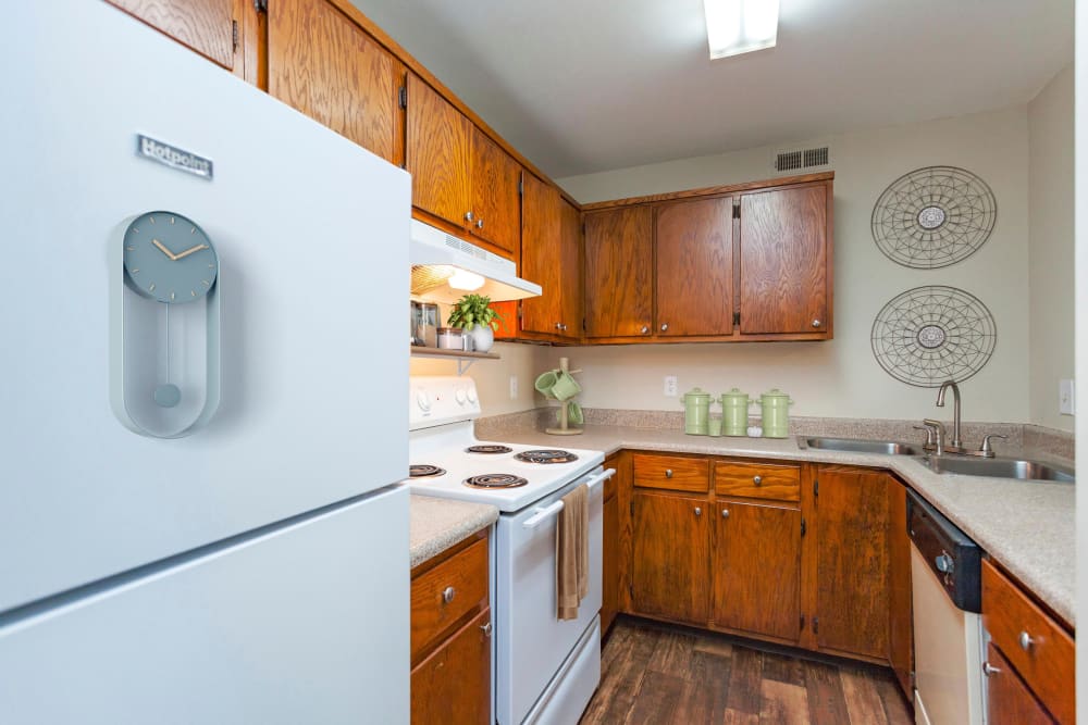 Kitchen with white appliances at Southwood Apartments in Nashville, Tennessee