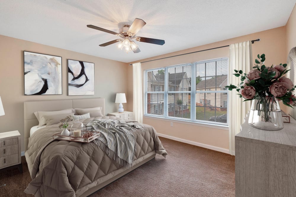 Bedroom with great natural light at The Cove at Cloud Springs Apartment Homes in Fort Oglethorpe, Georgia