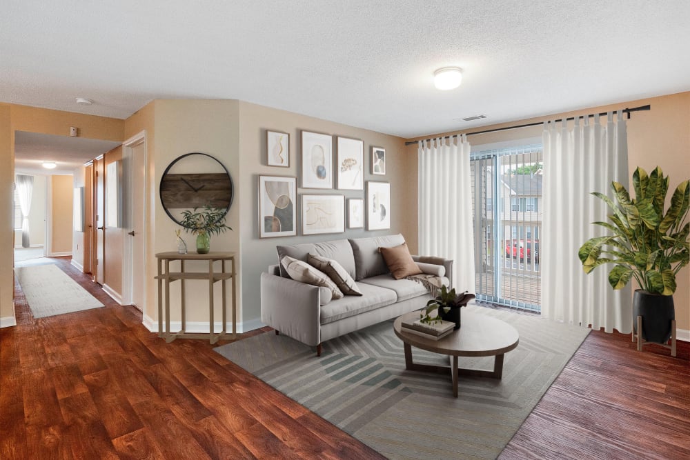 Kitchen and living room at The Cove at Cloud Springs Apartment Homes in Fort Oglethorpe, Georgia