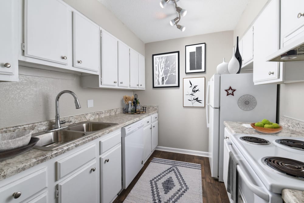 Kitchen with modern amenities at Valley Station Apartment Homes in Birmingham, Alabama