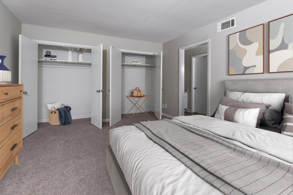 Bedroom with two large closets at Valley Station Apartment Homes in Birmingham, Alabama