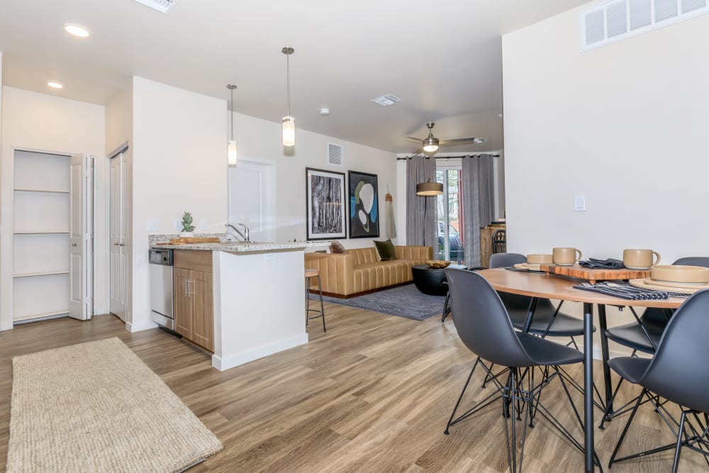 Spacious apartment with wood-style flooring at Trailside Apartments in Flagstaff, Arizona