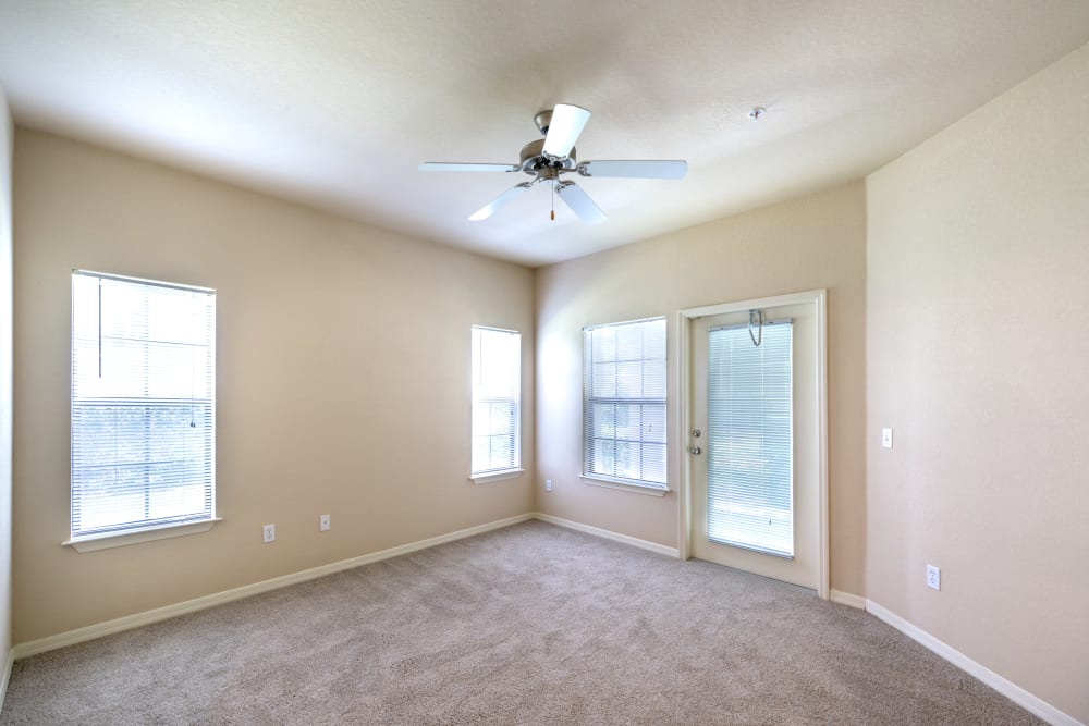 Beautiful hardwood flooring throughout bedroom of a model home at Mirador & Stovall at River City in Jacksonville, Florida