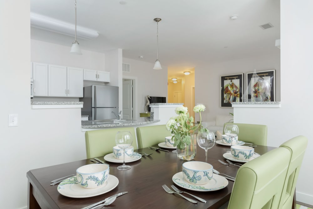 A set dining room table in an apartment at Sound at Gateway Commons in East Lyme, Connecticut