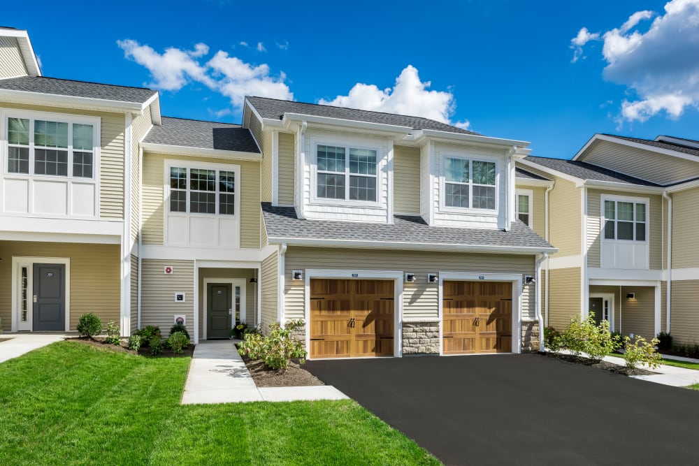 Driveway and exterior of townhomes at Cove at Gateway Commons in East Lyme, Connecticut