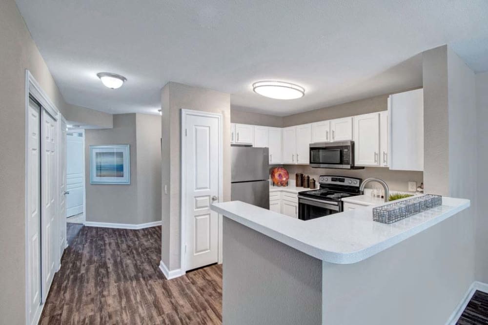 Kitchen with countertop at Arbrook Park Apartment Homes in Arlington, Texas