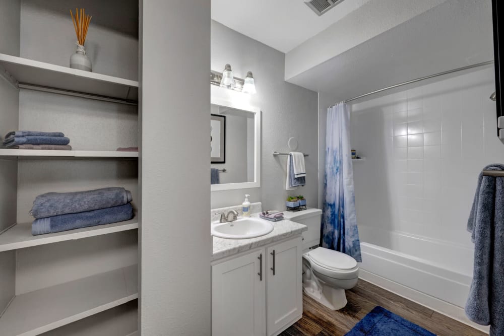 Bathroom with dresser at Hampden Heights Apartments in Denver, Colorado