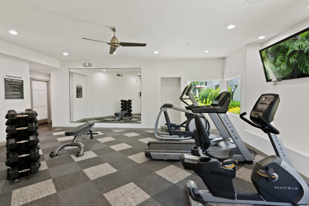 Exercise equipment in the fitness center at Casa Santa Fe Apartments in Scottsdale, Arizona