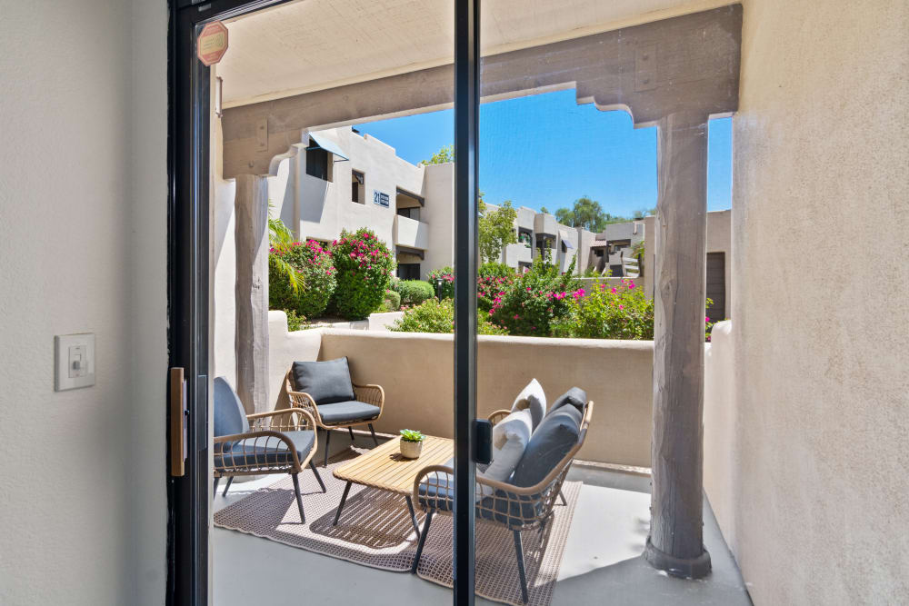 Sliding glass doors to private patio at Casa Santa Fe Apartments in Scottsdale, Arizona